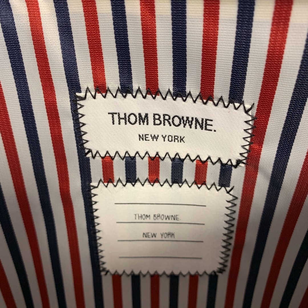 [TOM BROWNE -톰브라운 ] 톰브라운  22SS 강아지 클러치